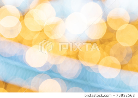 Gold black abstract light bokeh. Festive glitter blur background. Christmas and New Year holidays backdrop. Gold black abstract light bokeh. Festive glitter blur background. Christmas and New Year holidays backdrop. 73952568
