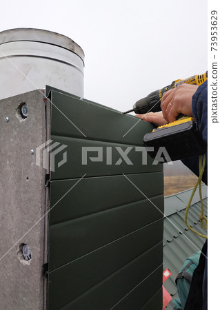 Facing a new chimney on a new two-story house 73953629