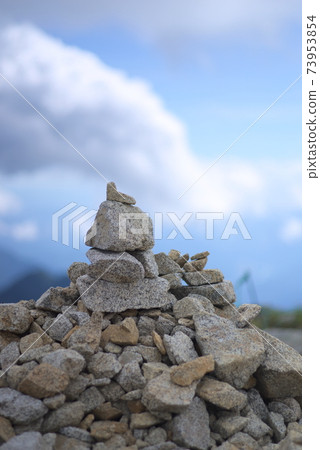 Stones piled up on the summit of Mt. Kisokoma 73953854