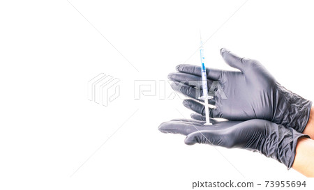 Vaccine isolated. Doctor hand in medical glove hold syringe with needle for protection flu virus and coronavirus. Covid vaccine isolated on white. Disease care hospital prevention. 73955694