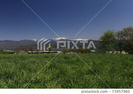 Remaining snow Southern Alps grassland Kai Komagatake Senjogatake Kitadake Ina City Masumigaoka Remaining snow Southern Alps grassland Kai Komagatake Senjogatake Kitadake Ina City Masumigaoka 73957960
