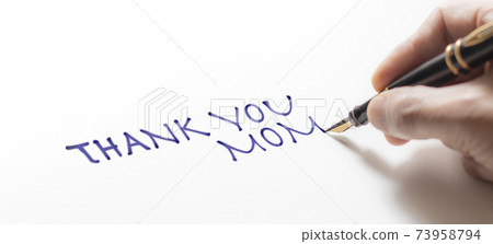 Hand writing the message of THANK YOU MOM 73958794