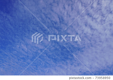 Cirrocumulus in clear autumn 73958950
