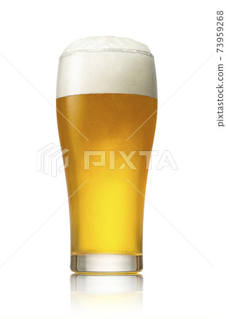 Draft beer poured into a glass 73959268