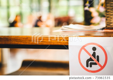 Alternative seating mark for social distance rules in the cafe distance for one seat from other people to protect from Corona Virus(COVID-19), social distancing for infection risk.New normal lifestyle Alternative seating mark for social distance rules in the cafe distance for one seat from other people to protect from Corona Virus(COVID-19), social distancing for infection risk.New normal lifestyle 73961535