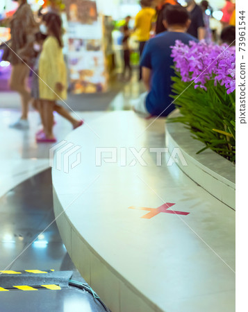 Alternative seating mark for social distance rules in the mall distance for one seat from other people to protect from Corona Virus(COVID-19), social distancing for infection risk.New normal lifestyle Alternative seating mark for social distance rules in the mall distance for one seat from other people to protect from Corona Virus(COVID-19), social distancing for infection risk.New normal lifestyle 73961544