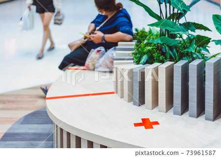 Alternative seating mark for social distance rules in the mall distance for one seat from other people to protect from Corona Virus(COVID-19), social distancing for infection risk.New normal lifestyle Alternative seating mark for social distance rules in the mall distance for one seat from other people to protect from Corona Virus(COVID-19), social distancing for infection risk.New normal lifestyle 73961587