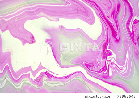 Fluid art texture. Closeup abstract pink, white and grey colors mixing of acrylic for use as background. Liquid acrylic artwork that flows and splashes with marble pattern 73962645