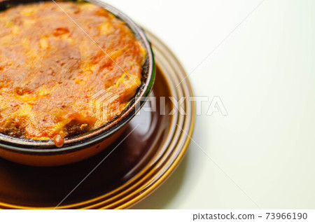 Traditional french onion gratin soup served in a ceramic bowl Traditional french onion gratin soup served in a ceramic bowl 73966190