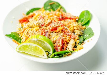 Tender paprika chicken with chilli and coriander wholewheat pasta, vegetables and a tingling sweet chilli dressing Tender paprika chicken with chilli and coriander wholewheat pasta, vegetables and a tingling sweet chilli dressing 73966374