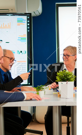 Senior woman manager waiting team for business conference 73970561
