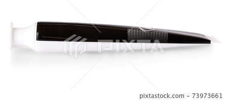 close up of a black tube isolated on white background 73973661