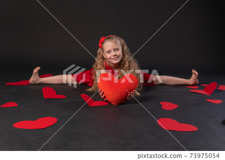 In twine in the hands of the heart paper hearts love valentine background, valentine heart, on the floor hearts romance. the honeymoon form. event forever, hearts in a red girl dress, barefoot 73975054