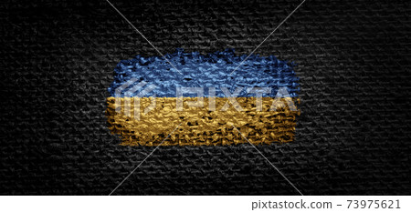 National flag of the Ukraine on dark fabric National flag of the Ukraine on dark fabric 73975621