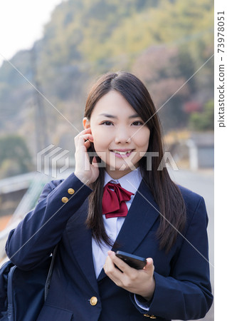 High school girls going to school High school students High school girls going to school High school students 73978051