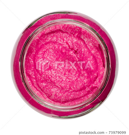 Beet spread, in a glass jar, from above. Beetroot bread spread, with an intense purple color, made with cooked red beets. Colorful, healthy and vegan food. Close-up, on white background, food photo. Beet spread, in a glass jar, from above. Beetroot bread spread, with an intense purple color, made with cooked red beets. Colorful, healthy and vegan food. Close-up, on white background, food photo. 73979099