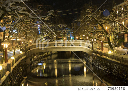 Kinosaki Onsen night view snow scene Kinosaki Onsen night view snow scene 73980158