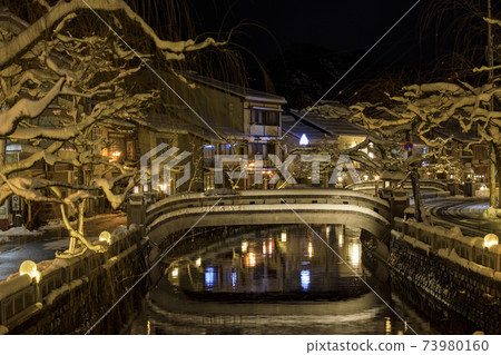 Kinosaki Onsen night view snow scene Kinosaki Onsen night view snow scene 73980160