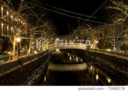 Kinosaki Onsen night view snow scene Kinosaki Onsen night view snow scene 73980176