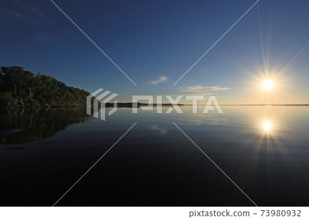 Sunrise over the water in Everglades National Park, Florida. 73980932
