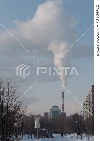 smoking pipe in the city, street photography 73984422
