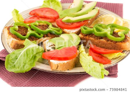 Sandwiches on beige plate Sandwiches on beige plate 73984841