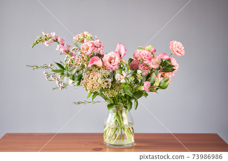 Bouquet 001. Finished flower arrangement in a vase for home. Flowers bunch, set for interior. Fresh cut flowers for decoration home. European floral shop. Delivery fresh cut flower. Bouquet 001. Finished flower arrangement in a vase for home. Flowers bunch, set for interior. Fresh cut flowers for decoration home. European floral shop. Delivery fresh cut flower. 73986986