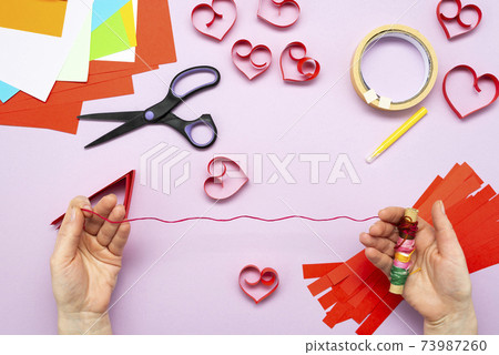 DIY instruction. Step by step guide. The process of making a garland of hearts for Valentine's Day DIY instruction. Step by step guide. The process of making a garland of hearts for Valentine's Day 73987260