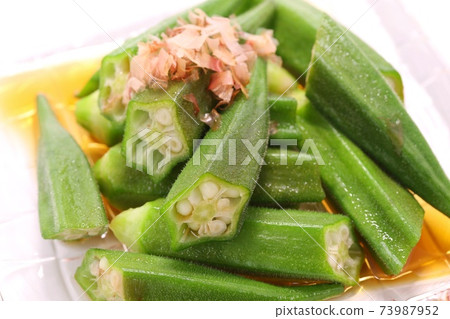 Okra glass plate bright background Okra glass plate bright background 73987952