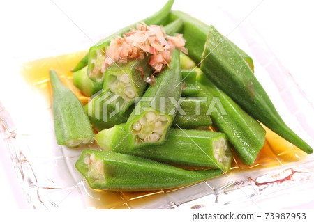 Okra glass plate bright background 73987953