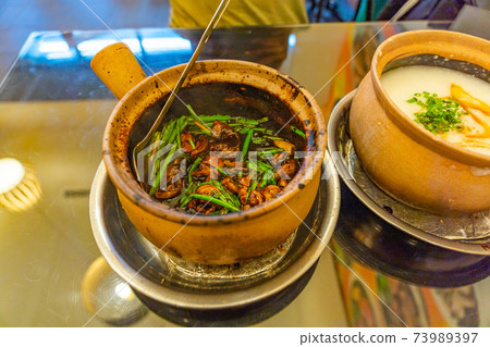 Famous Singapore dish- frog and spring onion congee porridge Famous Singapore dish- frog and spring onion congee porridge 73989397