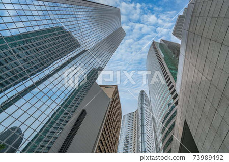 Upward view photo of financial office building in Makati City, Philippines Upward view photo of financial office building in Makati City, Philippines 73989492