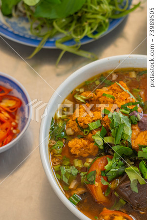 Bowl of delicious Bun Rieu noodle - Vietnamese cuisine 73989505