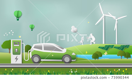 Green sustainable energy ecology development, environment friendly concept. Electric car power charging, family resting in natural park background. 73990344