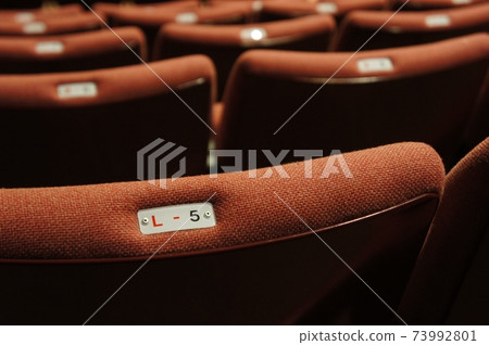 Theater seats with number tags 73992801