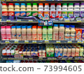 Blur image of shelf with consumer product shop in supermarket 73994605