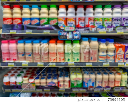 Blur image of shelf with consumer product shop in supermarket 73994605