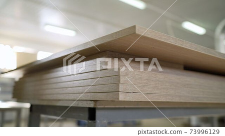 Joiner's shop. Wooden blanks for furniture. Furniture repair. Furniture workshop. Blanks for wooden furniture at the factory. Joiner's shop. Wooden blanks for furniture. Furniture repair. Furniture workshop. Blanks for wooden furniture at the factory. 73996129