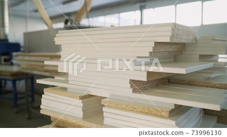 Joiner's shop. Wooden blanks for furniture. Furniture repair. Furniture workshop. Blanks for wooden furniture at the factory. Joiner's shop. Wooden blanks for furniture. Furniture repair. Furniture workshop. Blanks for wooden furniture at the factory. 73996130