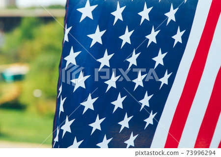 The flag of the United States is packed 73996294