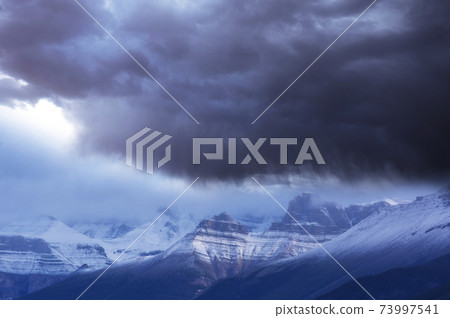Storm in mountains Storm in mountains 73997541