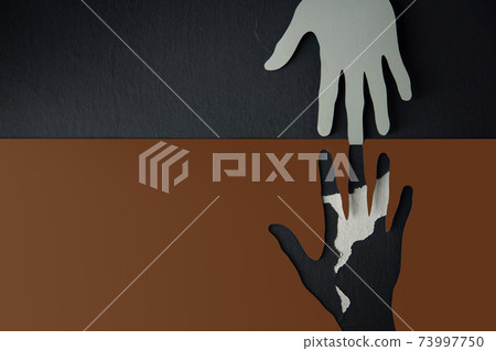 Help, Care, Support or Partnership Concept. Paper Cut as Hands Shape hanging on the wall. look like the top one trying to help the one below. Touching each other Help, Care, Support or Partnership Concept. Paper Cut as Hands Shape hanging on the wall. look like the top one trying to help the one below. Touching each other 73997750
