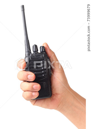 hand holding walkie-talkie isolated on white hand holding walkie-talkie isolated on white 73999679