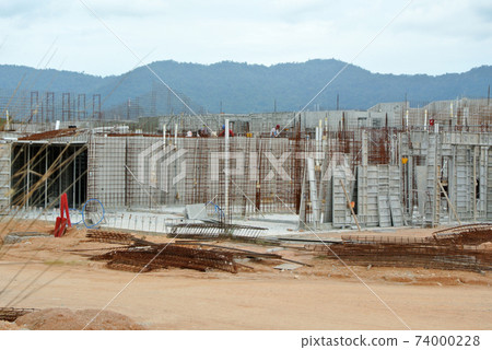 SEREMBAN, MALAYSIA -APRIL 09, 2020: New double story luxury terrace house under construction in Malaysia.  Designed by an architect with a modern and contemporary style.  74000228