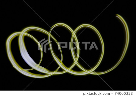 Yellow neon light swirl Yellow neon light swirl 74000338