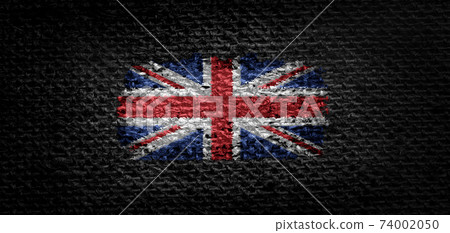 National flag of the United Kingdom on dark fabric 74002050