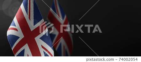 Small national flags of the United Kingdom on a dark background Small national flags of the United Kingdom on a dark background 74002054