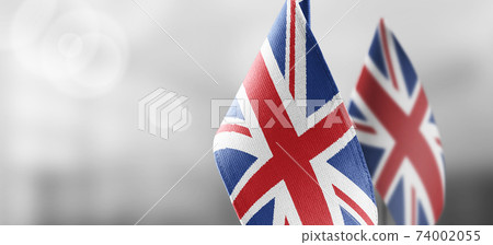 Small national flags of the United Kingdom on a light blurry background 74002055
