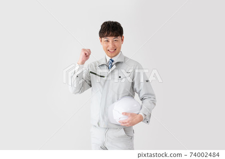 Male cosmonaut in space suit and helmet, holding helmet with hands, on  white background Stock Photo - Alamy