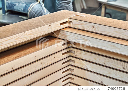 Joinery. Wood door manufacturing process. Stacked door leafs. Furniture manufacture Joinery. Wood door manufacturing process. Stacked door leafs. Furniture manufacture 74002726